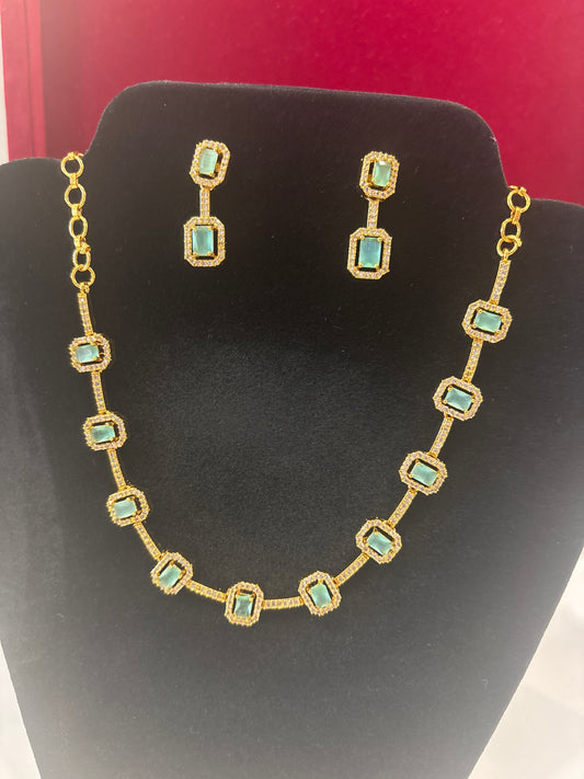 Amazing Teal Green And White Stones Studded Gold Plated Necklace With Earrings