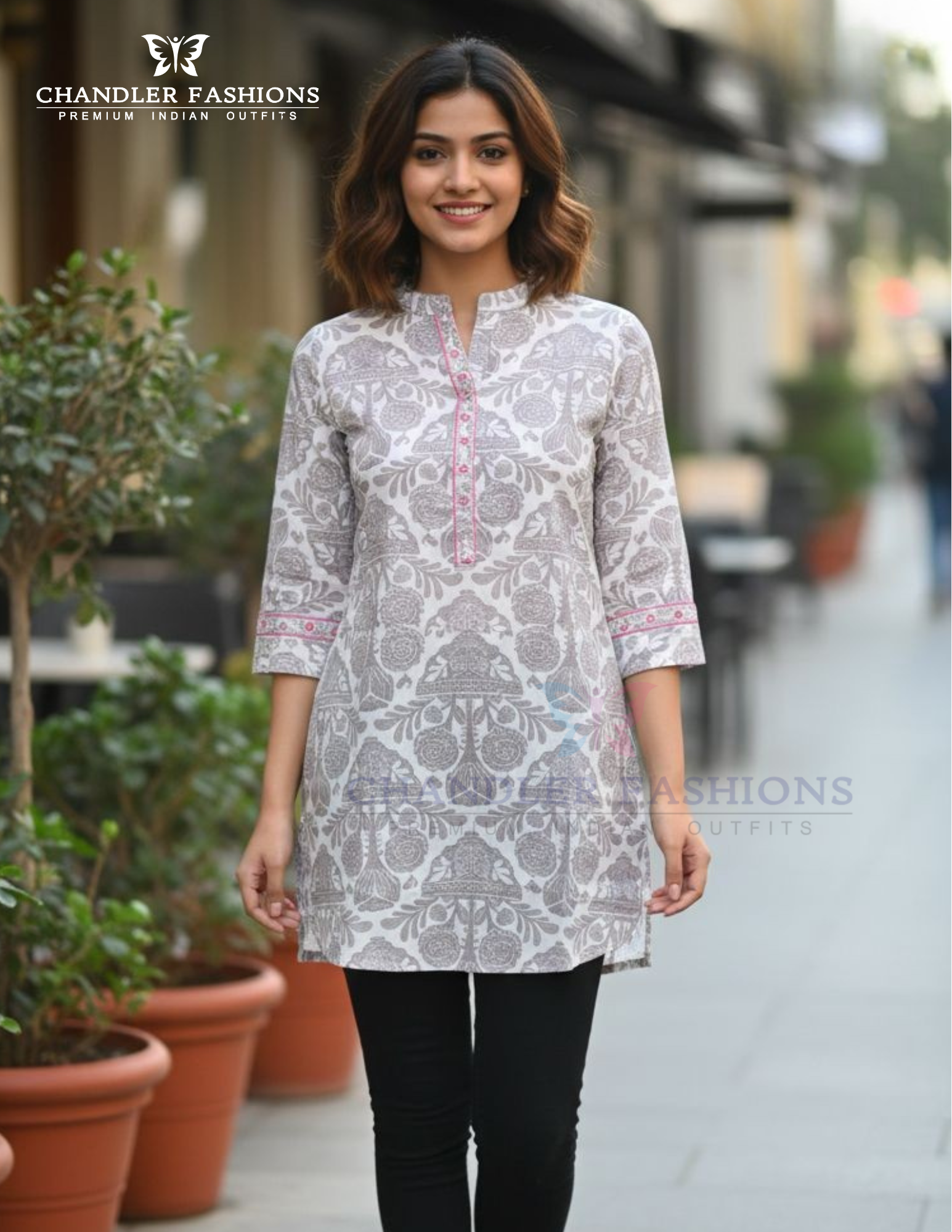 Fabulous White Color Rayon With Self Design Work Short Kurti For Women