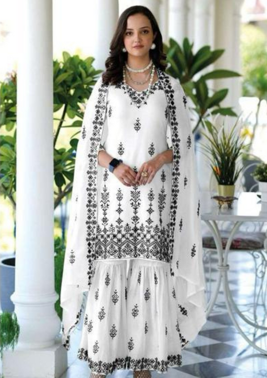 Gorgeous White Color Fancy Embroidery Work Kurti With Sharara Suits