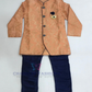 Alluring Light Orange Color Silk Cotton Sherwani Suit With Brooch Pin For Boys