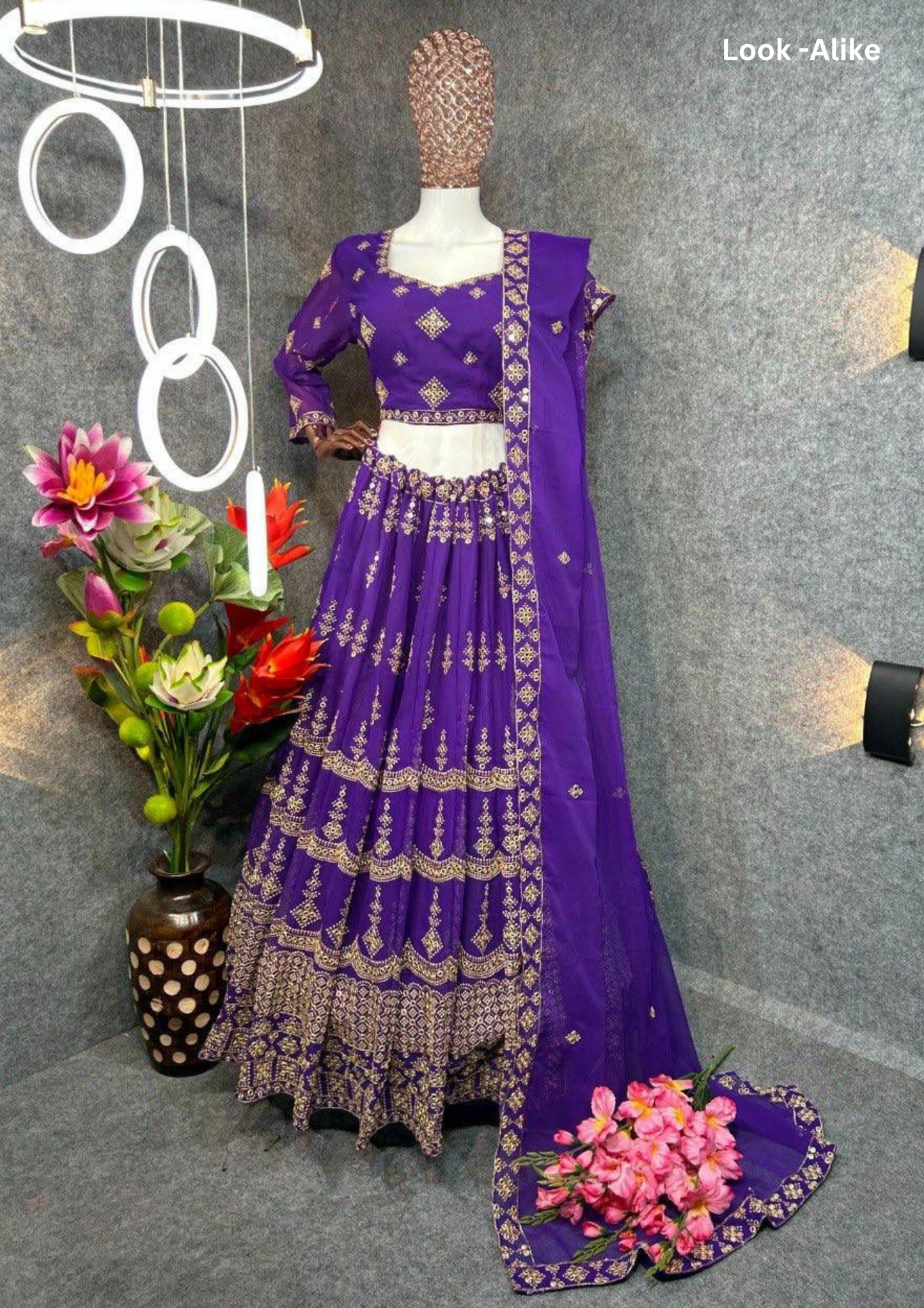 Attractive Purple Colored Party Wear Embroidered Georgette Lehenga Choli