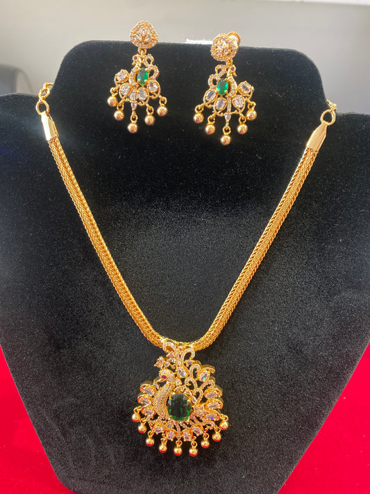 Amazing Green and White Color Stone Peacock Locket Gold Plated Necklace Set with Matching Earrings For Women