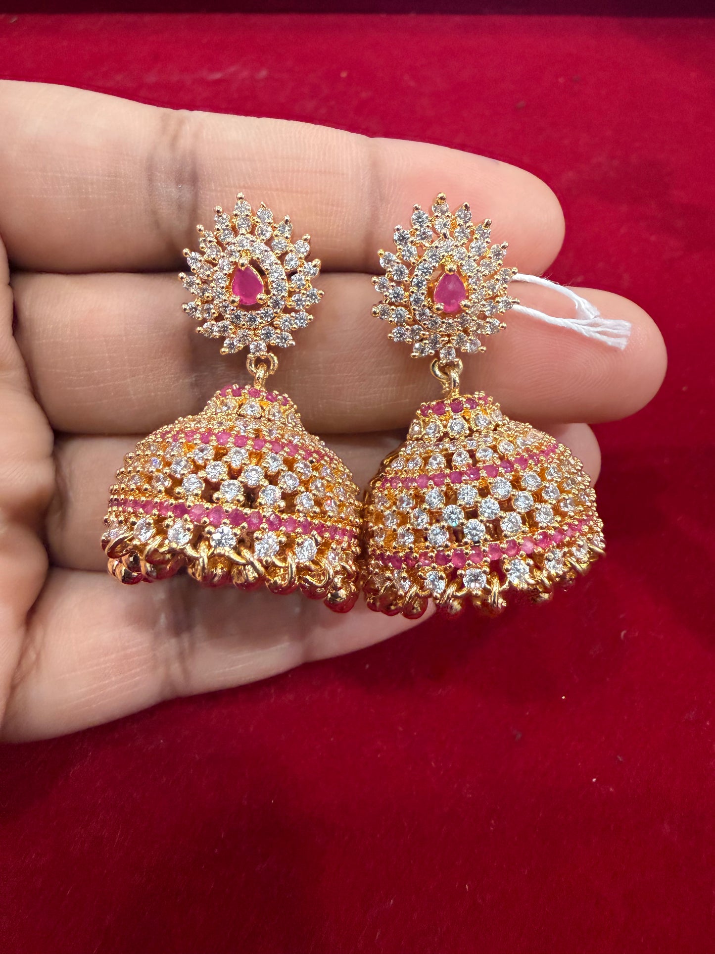 Alluring Pink And White Color Stones With Gold Plated Jhumkas For Women