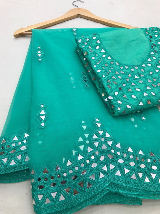 Gorgeous Teal Green Colored Net Embroidery And Mirror Work Sarees For Women