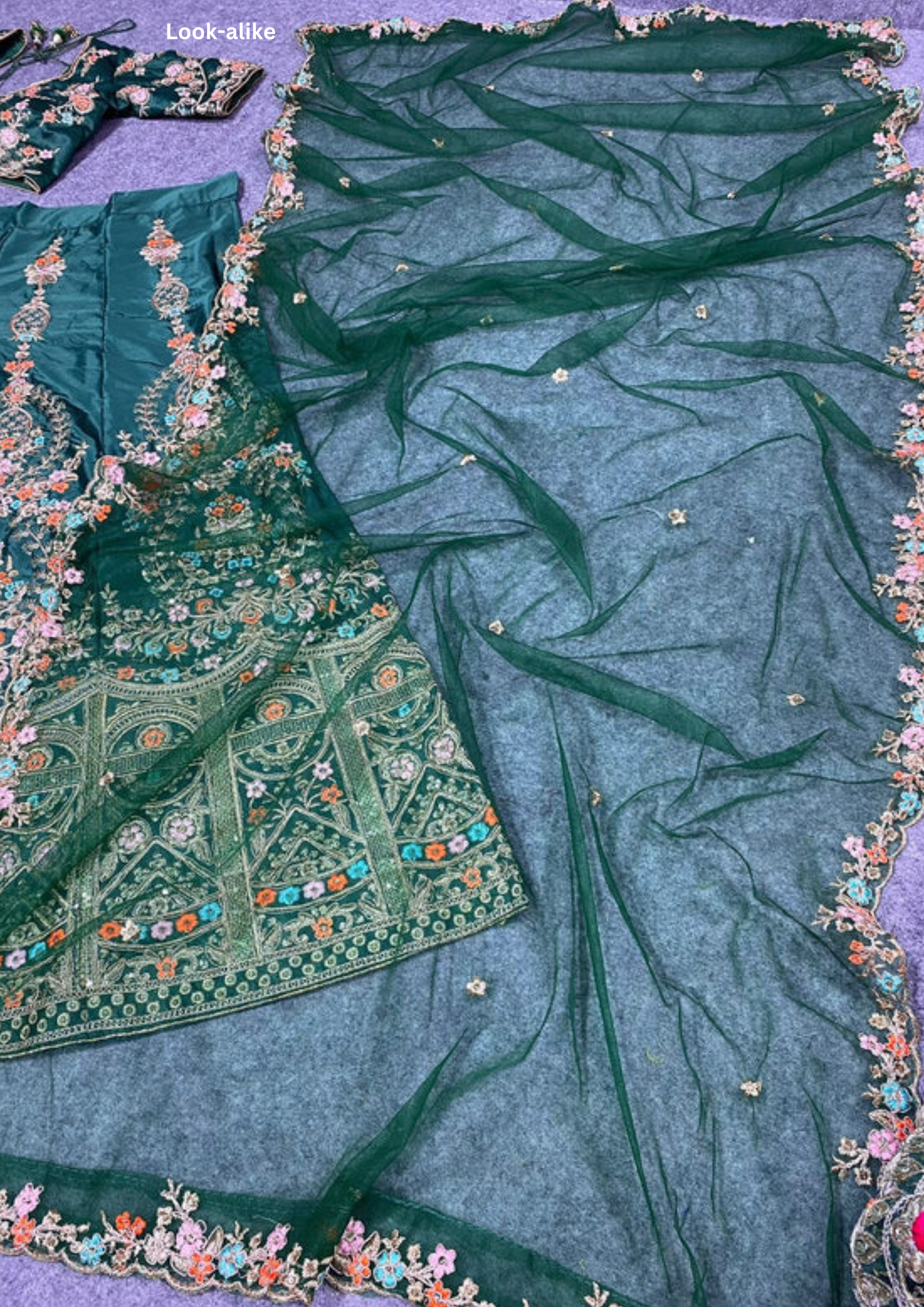 Dazzling Dusty Dark Green Colored Designer Lehenga With Embroidery Work For Wedding