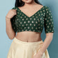 Appealing Green Colored V Neck And Back Open Blouse With Butta Motifs For Women