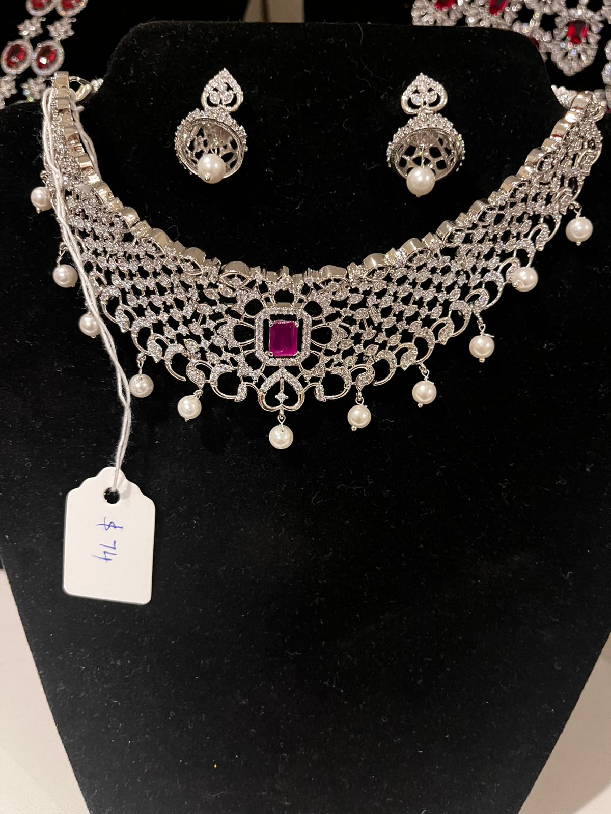 Alluring Pink Color Stone Design American Diamond Necklace With Earrings Sets