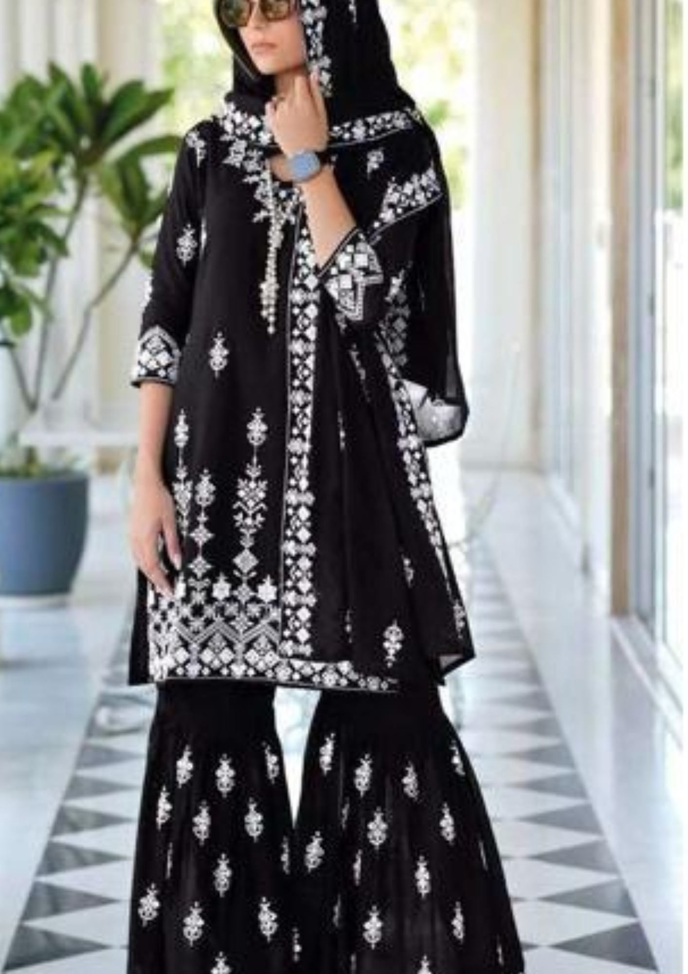 Lovely Black Color Kurti And White Fancy Embroidery  Work In Suncity