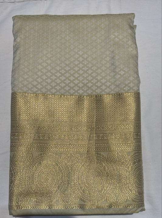 Beautiful Ivory And Gold Color Pure Kanchi Silk With Attractive Primium Gold Zari Work Border Saree For Women