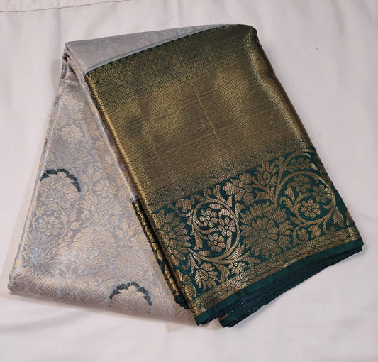 Wonderful Gray Color Pure Kanchi Silk With Green Border Gold Zari Work Saree For Women