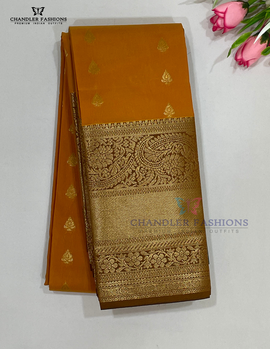 Fabulous Pumpkin Orange Color Pure Kanchi Silk With Green Pallu And Gold Zari With Paisley Motifs Work Saree For Women