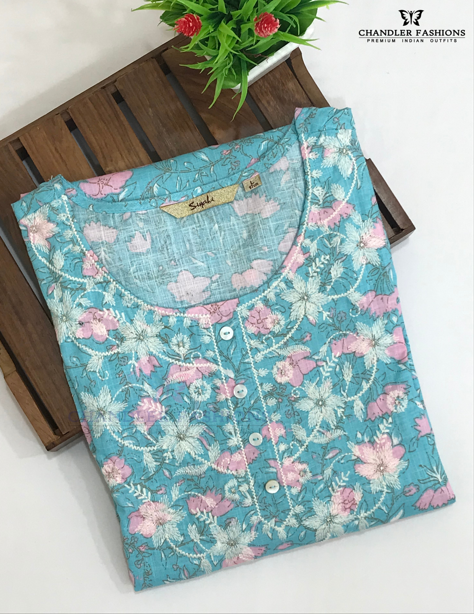Sky Blue Color Cotton With floral And Embroidery Work Kurti In USA