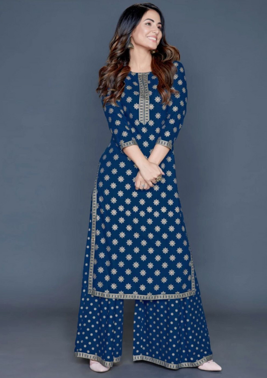 Gorgeous Blue Colored Gold Printed Rayon Kurti With Palazzo Suits For Women