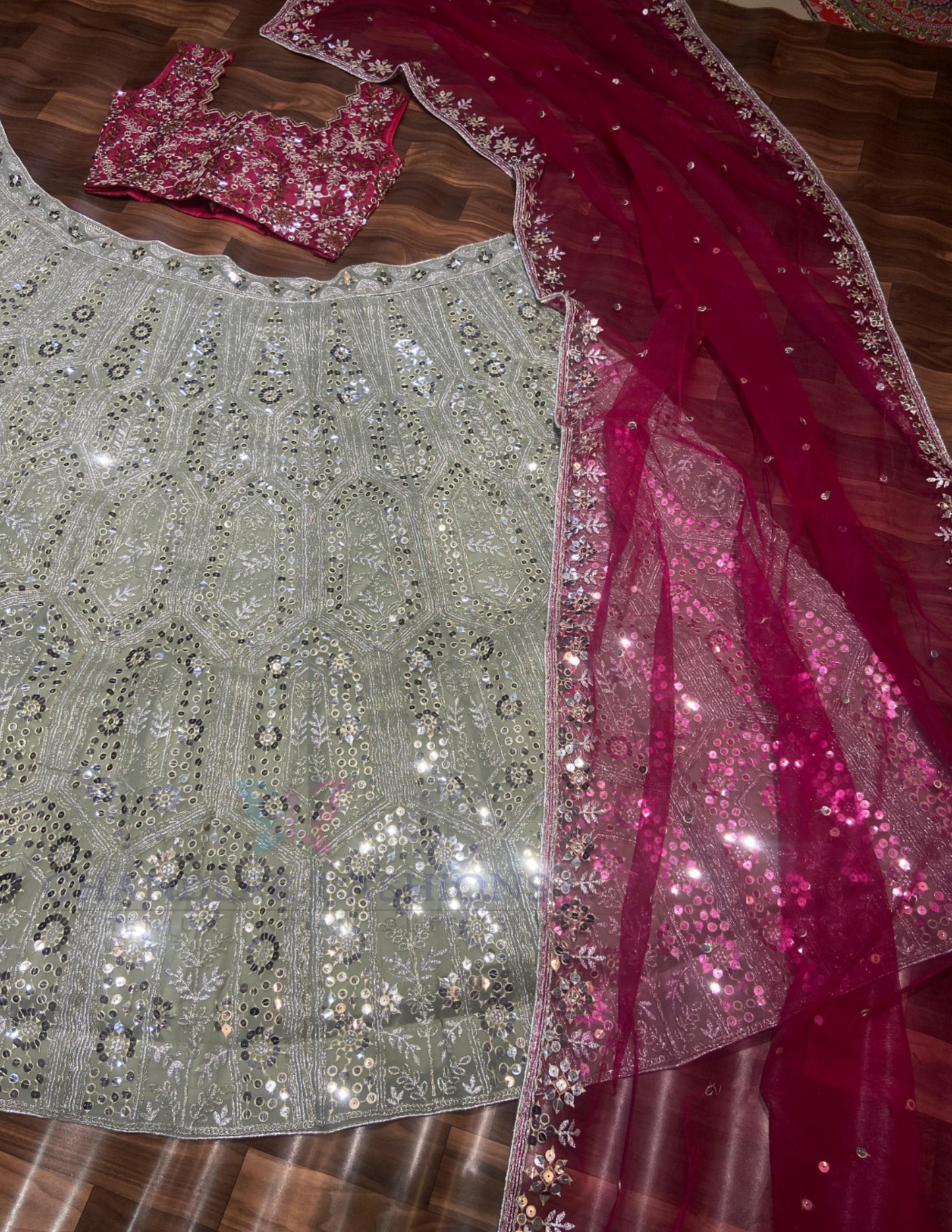 Attractive Pink And Grey Color Georgette Lehenga With Sequins Work In Suncity