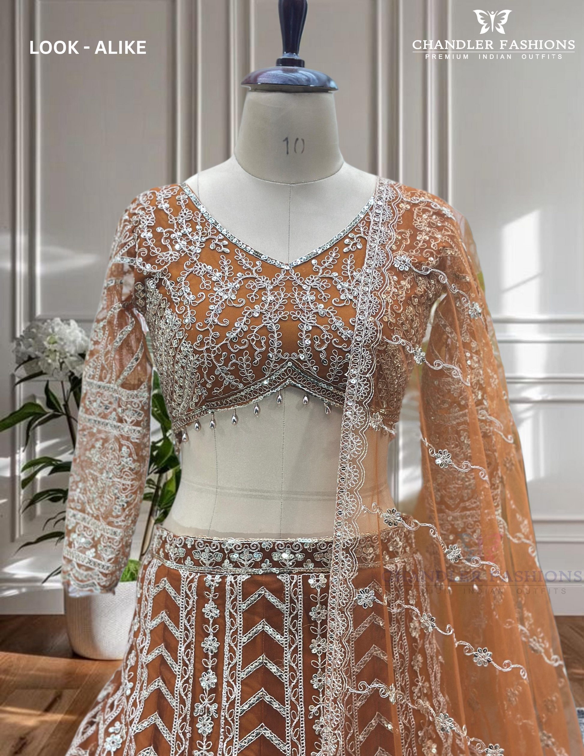 Wonderful Orange Color Lehenga Choli In Surprise