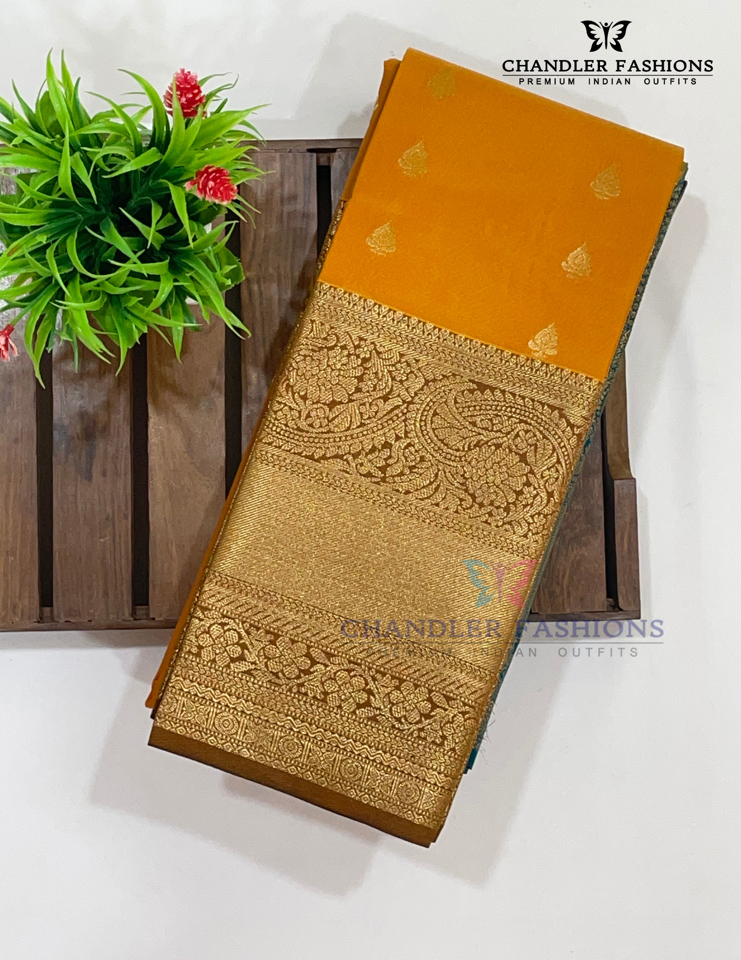 Pumpkin Orange Color Pure Kanchi Silk With Green Pallu And Gold Zari With Paisley Motifs Work Saree Near Me