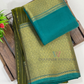 Gorgeous Olive Green Color Pure Kanchi Silk With Unique Motifs Border And Gold Zari Work Saree Near Me
