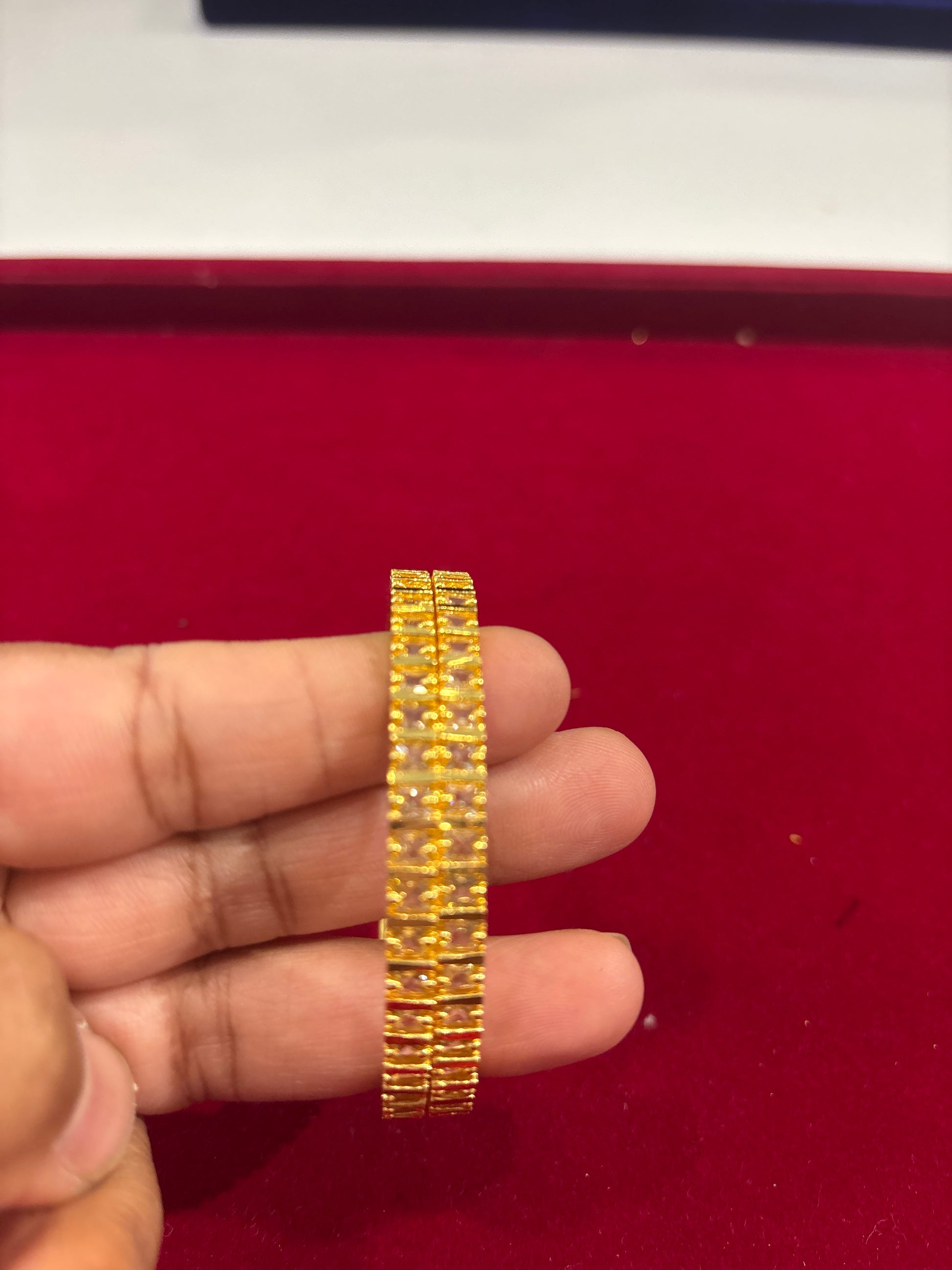 Alluring White Color Stones Gold Plated Bangles For Women