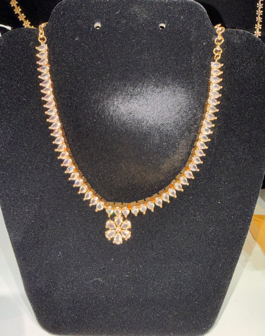 Alluring White Color Stones Studded Gold Plated Necklace For Women