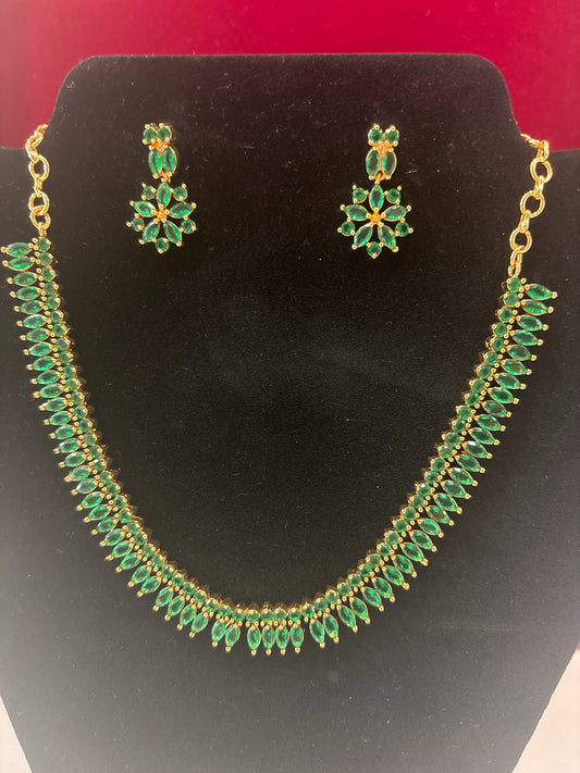 Stunning Green Color Stones Studded Gold Plated Necklace With Earrings Set