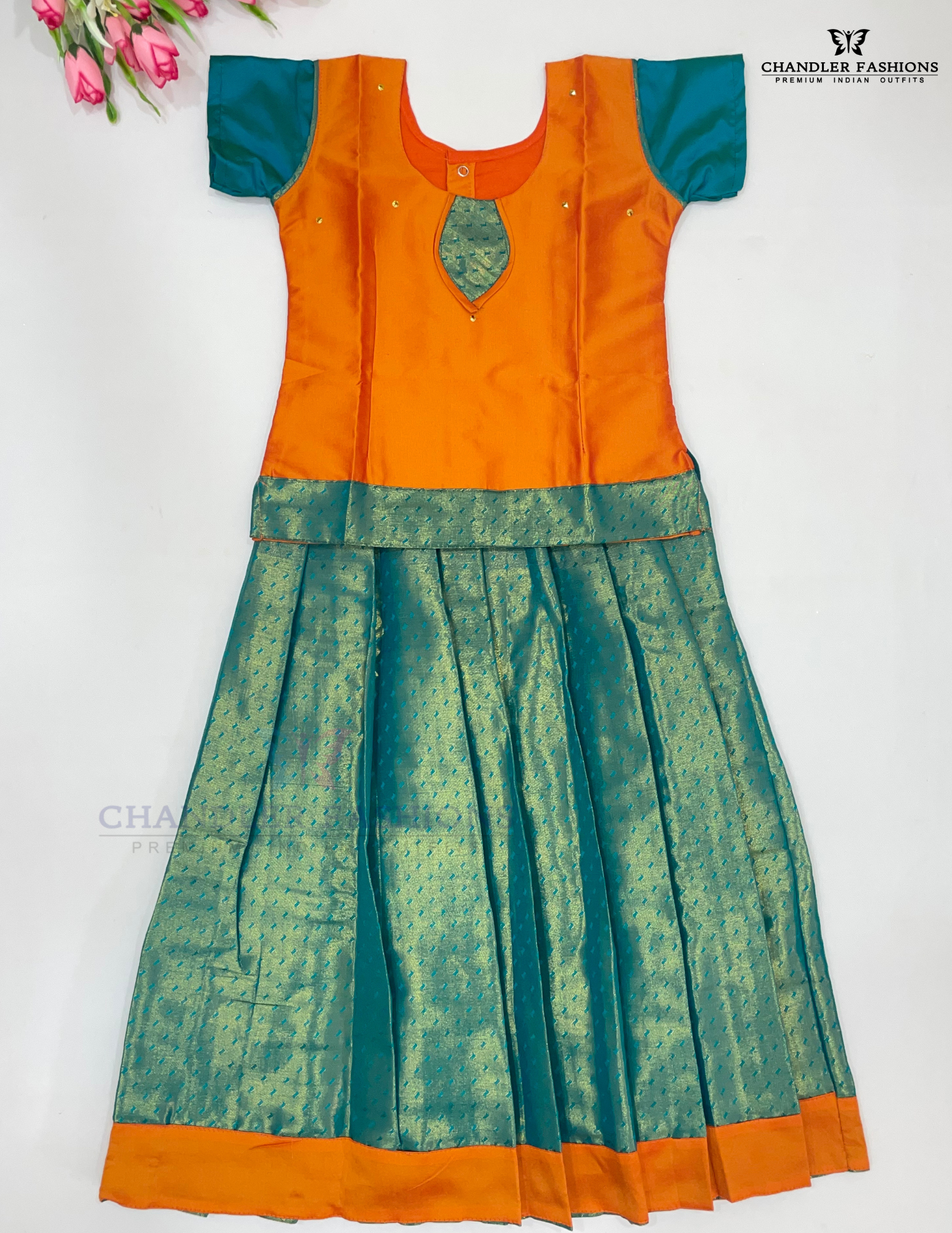Stunning Orange And Green Colored Silk Langa Sets With Stone Work For Girls