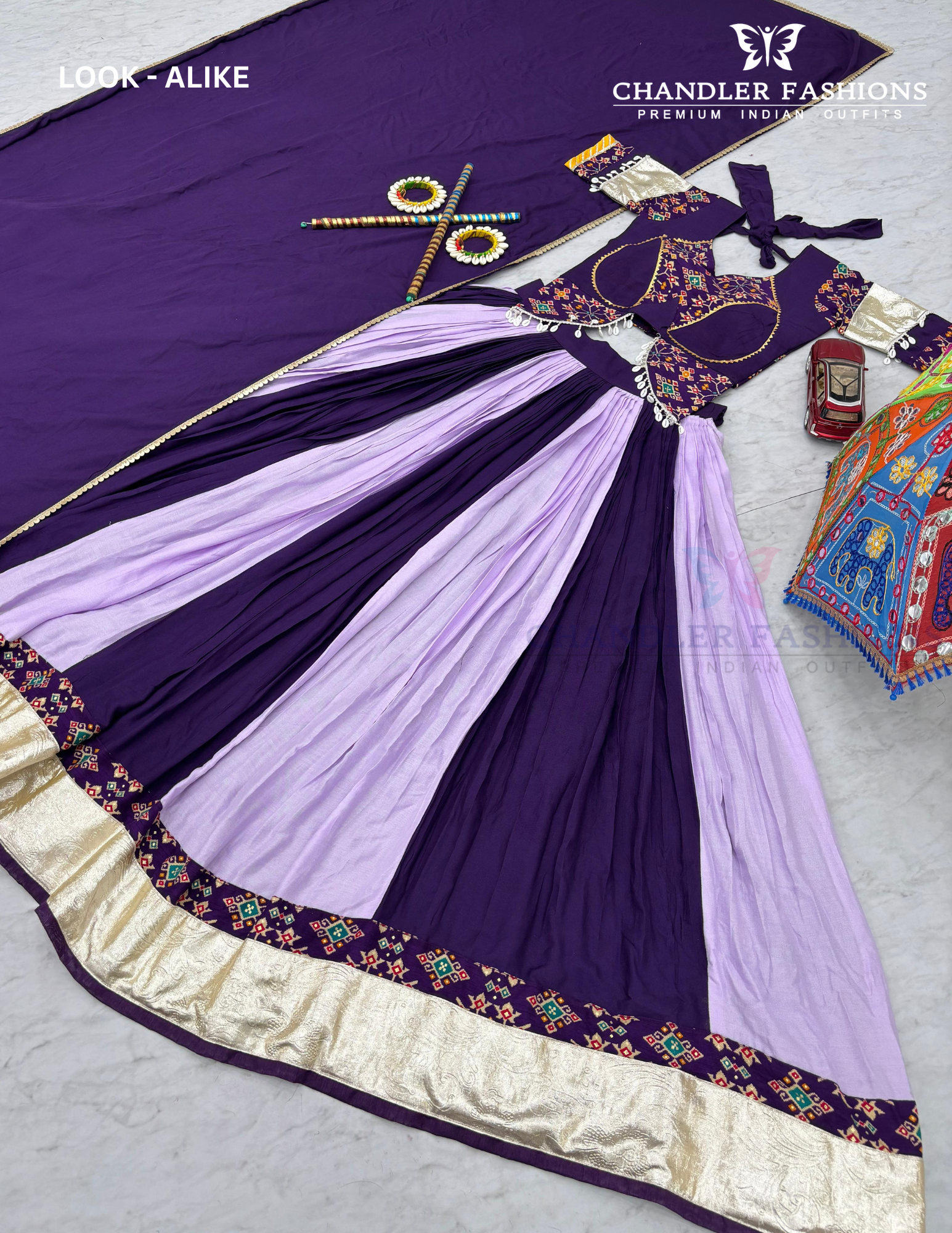 Purple Colored Ribbon Work Chaniya Choli Sets 