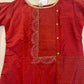 Red Kurti With Round Neck and Gold Designs