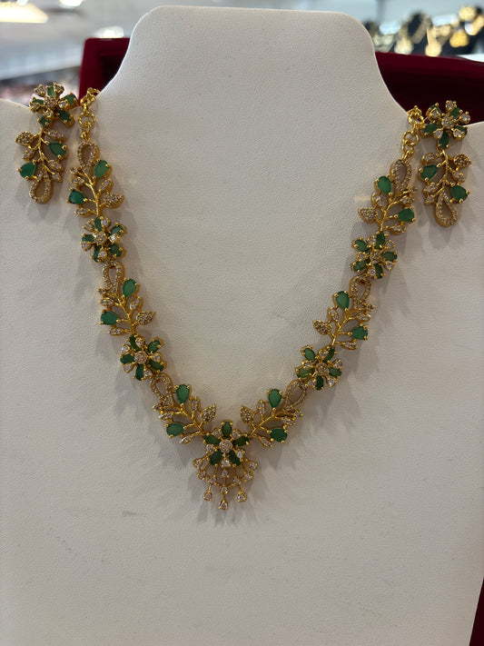Dazzling Green And White Stones Floral Design Gold Plated Necklace With Earrings Set