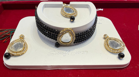 Elegant Black And White Stones And Beads Gold Plated Choker With Maang Tikka And Earrings