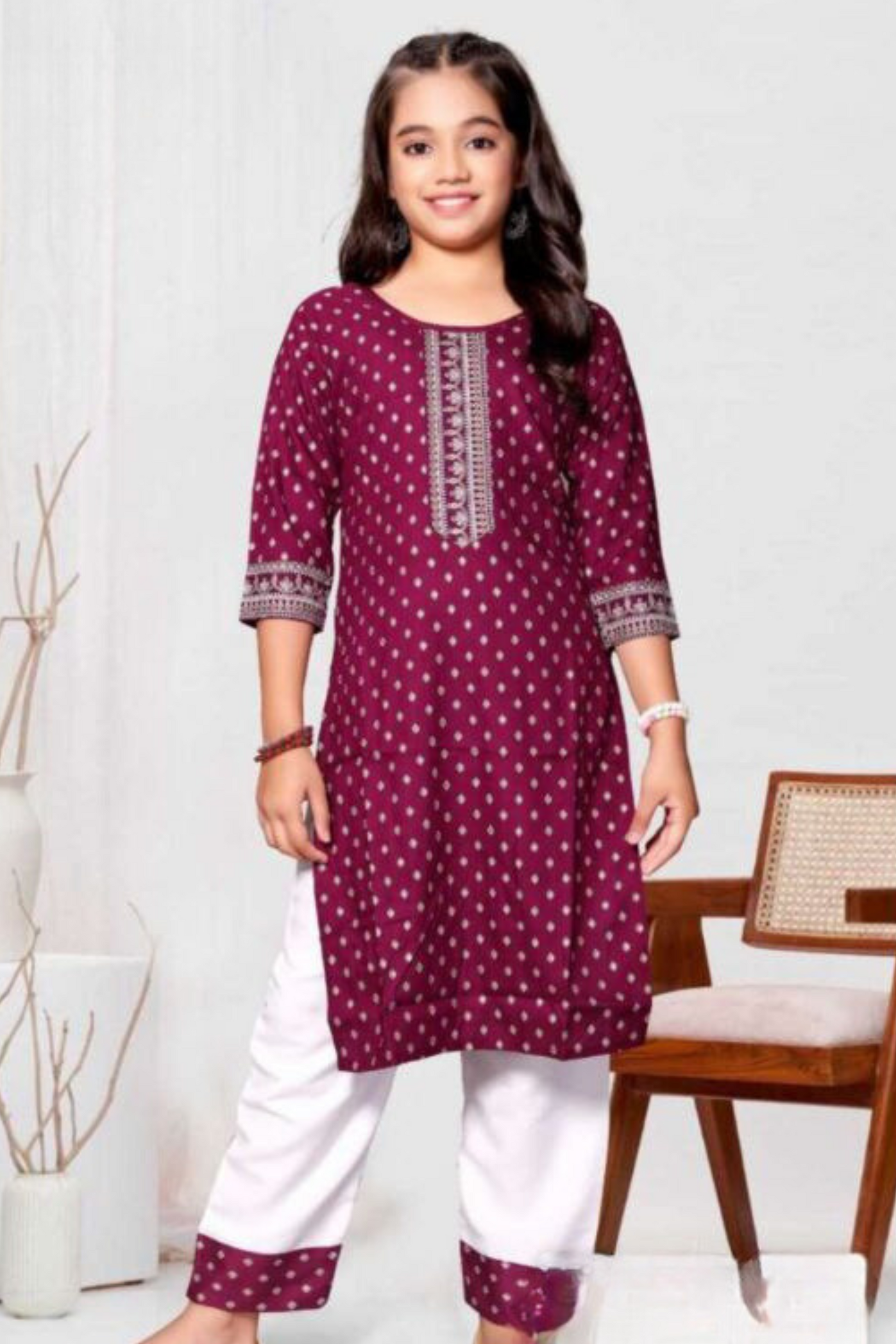 Appealing Wine Colored Rayon Print Kurti Suits For Girls