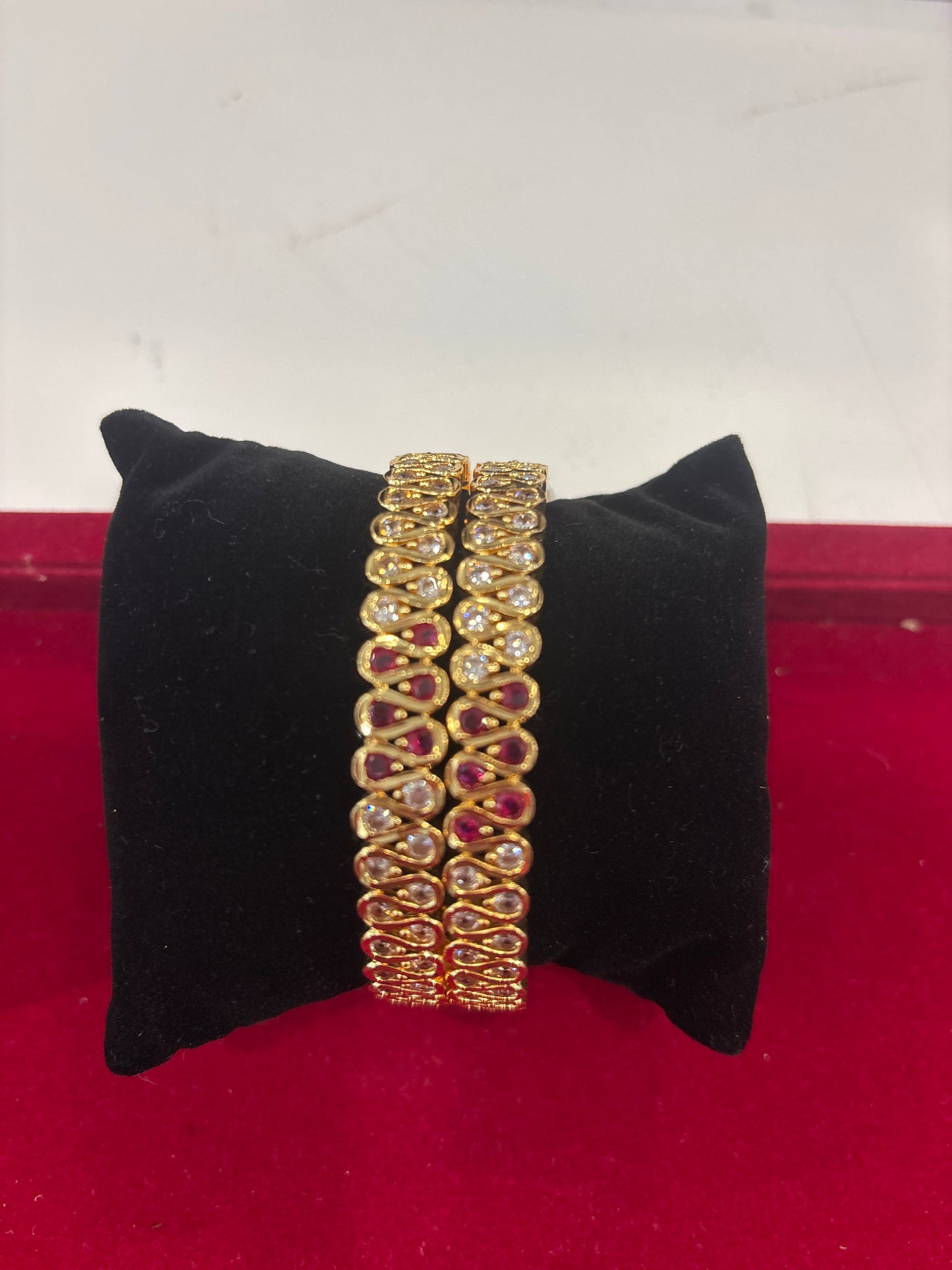 Marvelous White And Red Color Stones Gold Plated Bangle Set For Women 