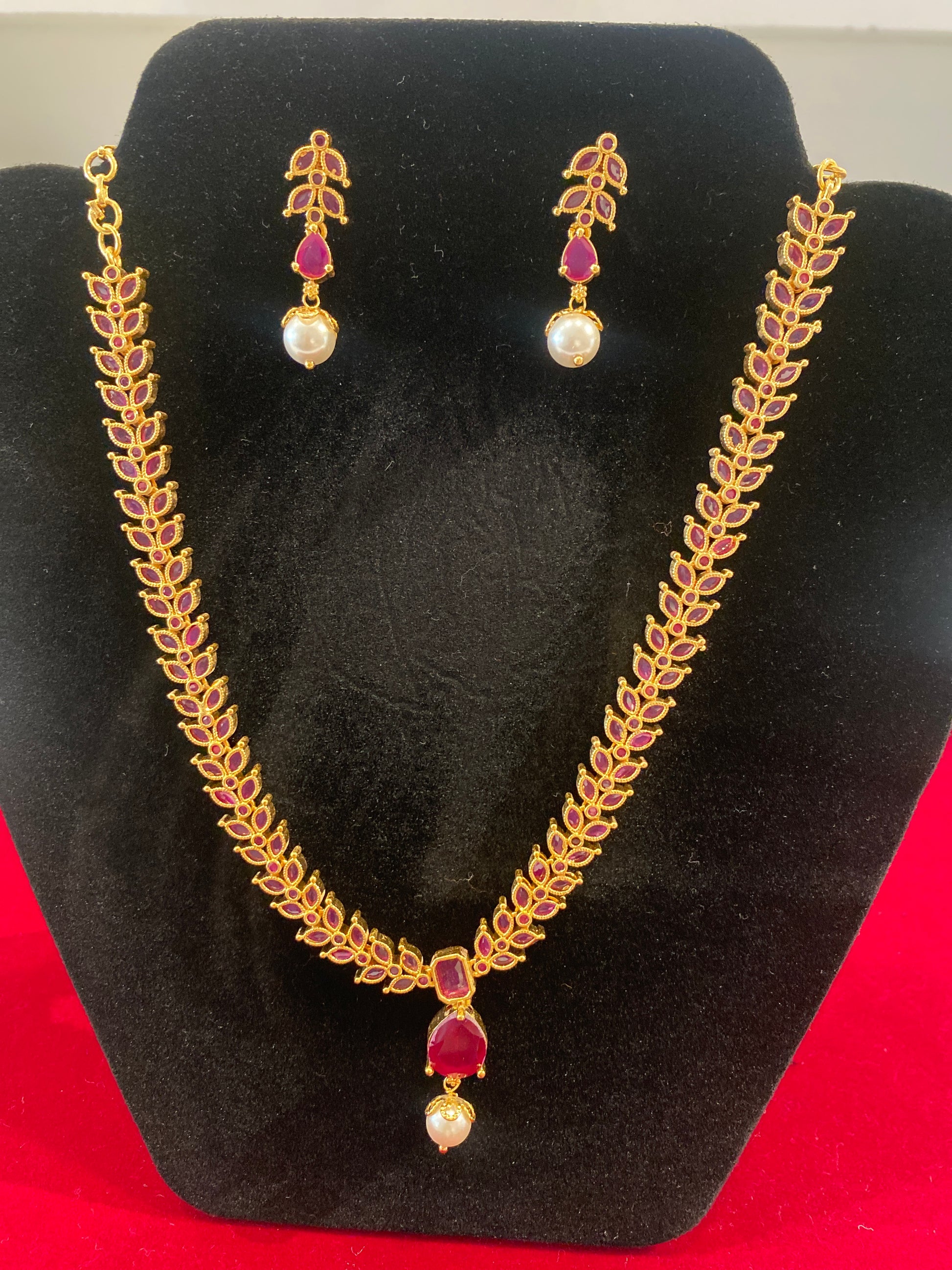 Stunning Red  Stones Gold Plated Necklace With Pearl Drop Earrings