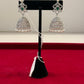 Elegant White And Green Stones American Diamond Jhumkas With White Pearls