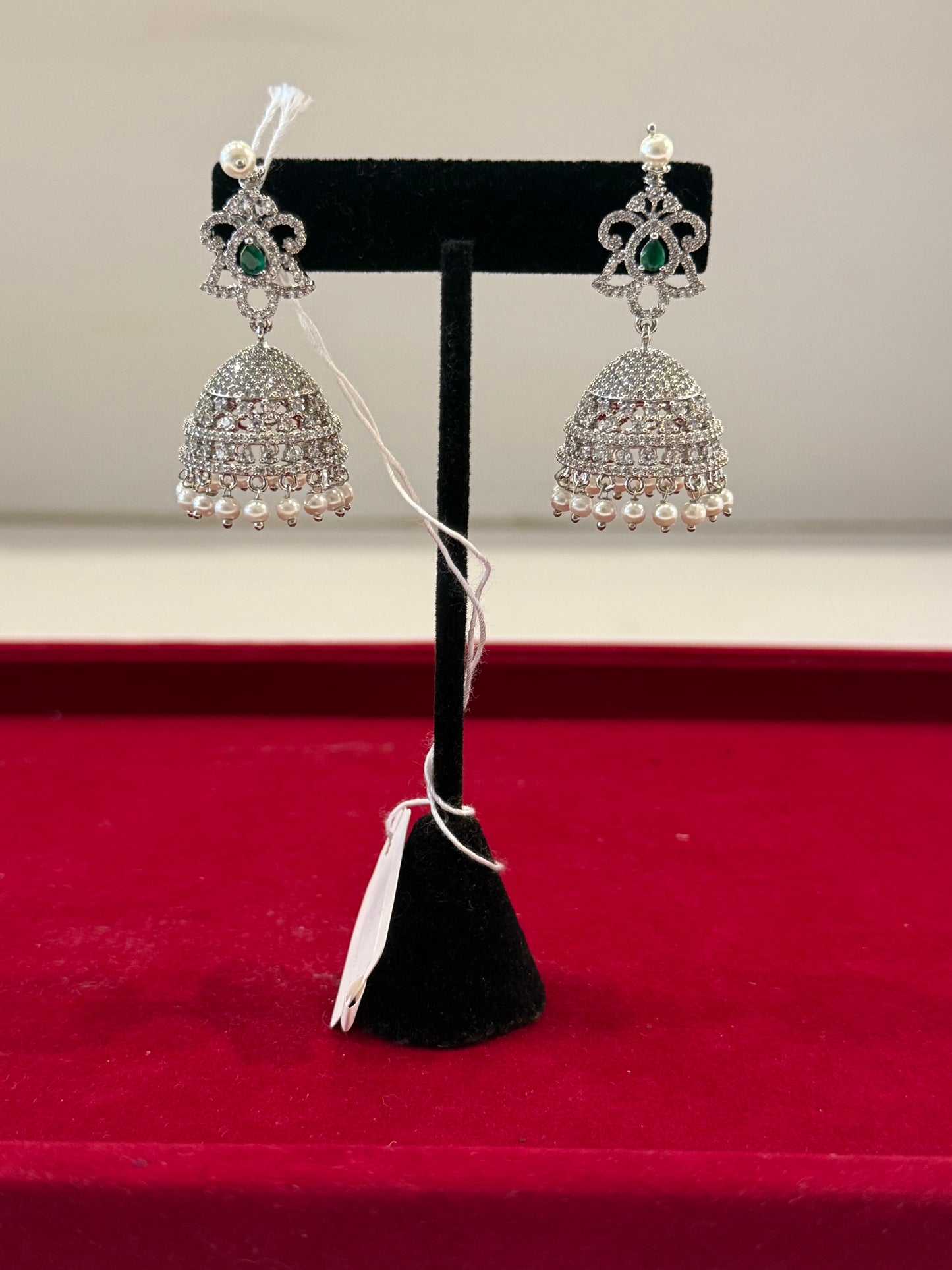 Elegant White And Green Stones American Diamond Jhumkas With White Pearls