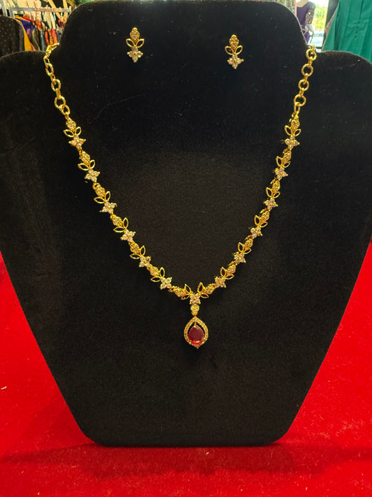 Charming White And Pink Stones Studded Gold Plated Necklace With Earrings Set