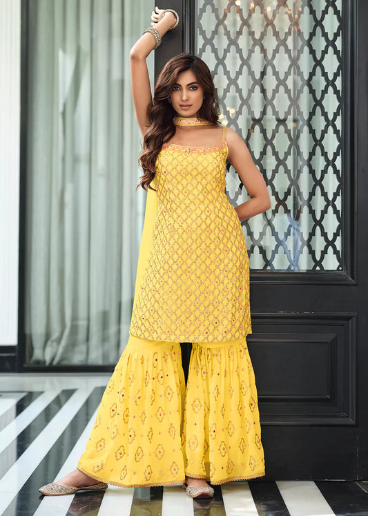 Appealing Ethnic Wear Yellow Colored Kurti With Palazzo Suits With Dupatta