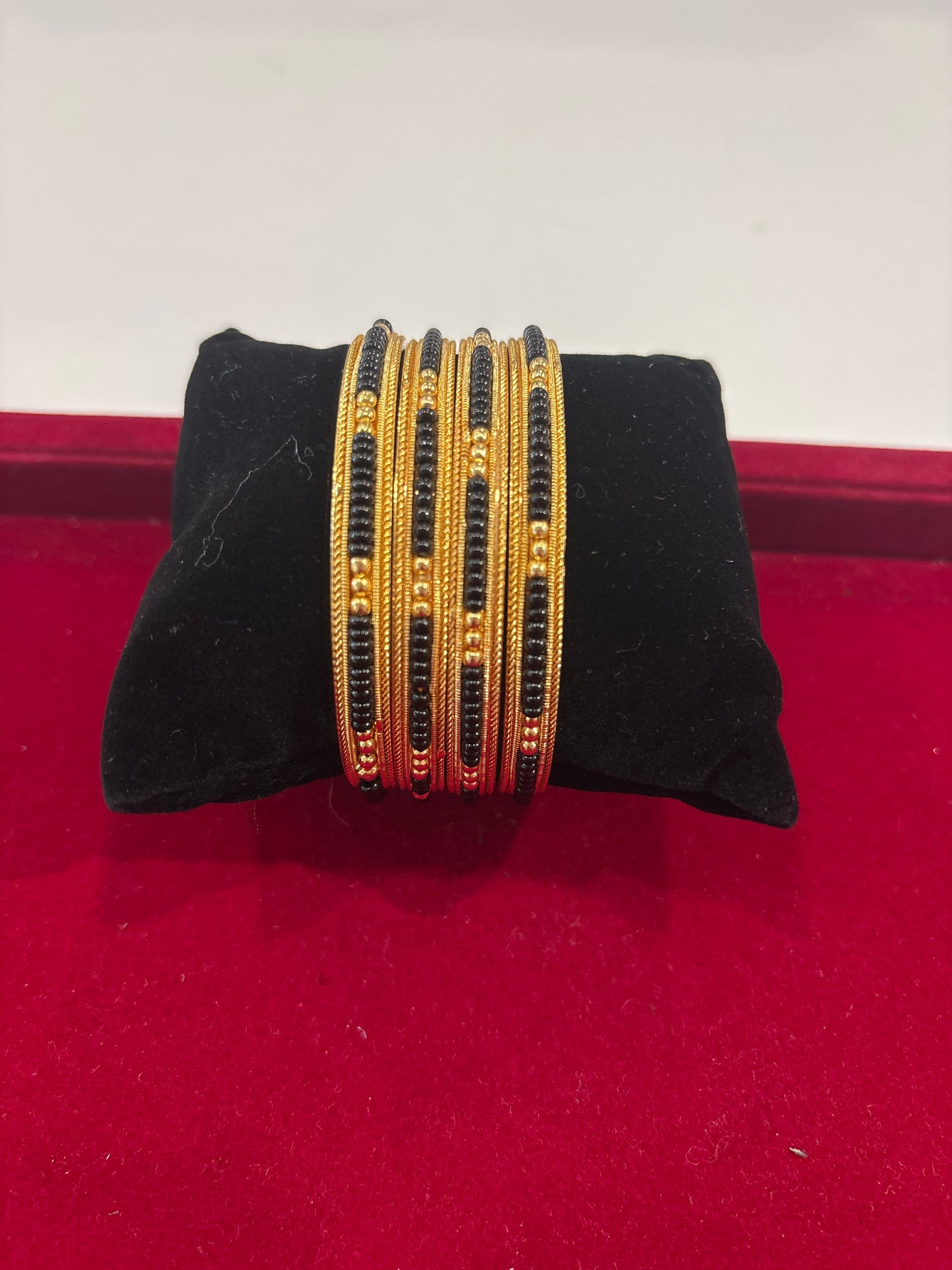 Alluring Black And Gold Beads Gold Plated  Bangle Set For Women