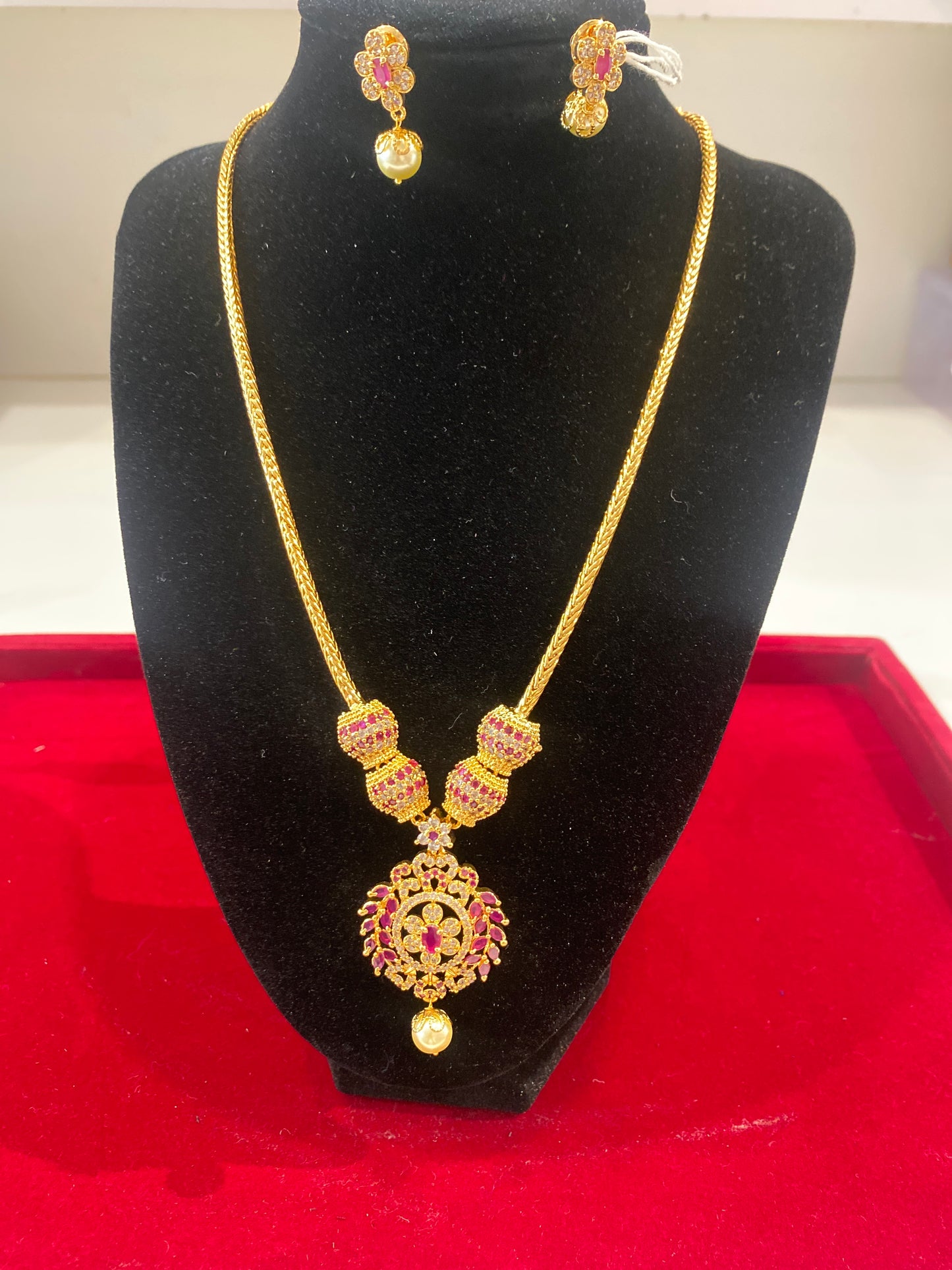 Appealing Dark Pink And White Color Stones Gold Plated Necklace With Earrings For Women