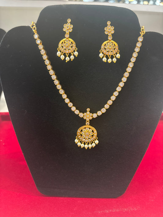  Delightful White Color Stones Gold Plated Necklace Set With Matching Earrings 