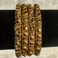Attractive Red And Green Stones Studded Antique Gold Bangles For Women