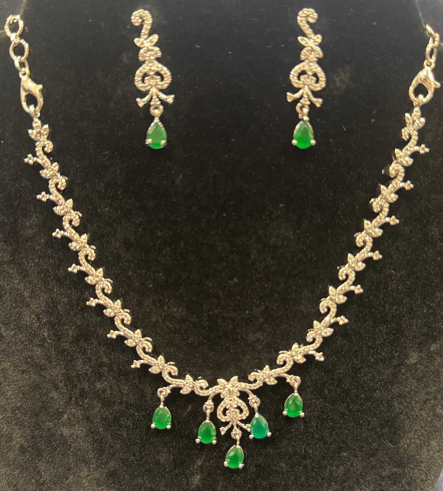 Pleasing Designer American Diamond White And Green Color Stones Necklace And Earrings Set