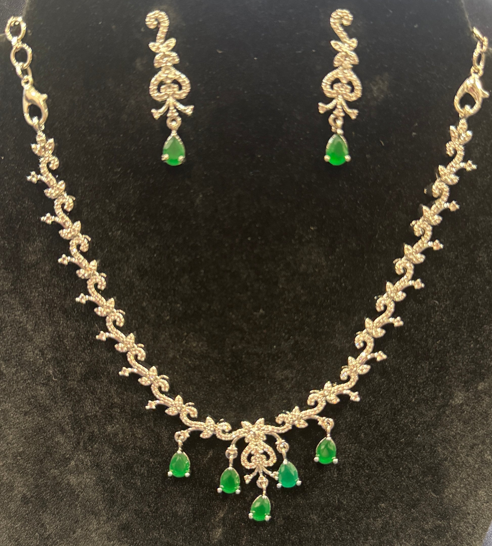 Pleasing Designer American Diamond White And Green Color Stones Necklace And Earrings Set