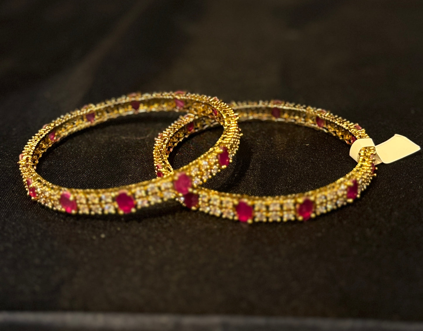Marvelous Red And White Stones Gold Plated Studded Bangles For Women