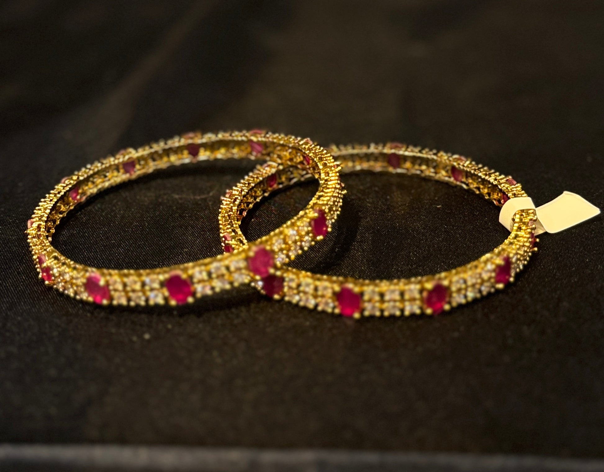 Marvelous Red And White Stones Gold Plated Studded Bangles For Women