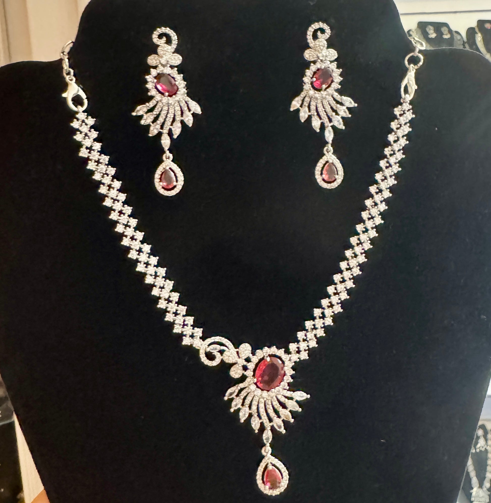 Alluring White And Red Color Stones American Diamond Necklace With Earrings
