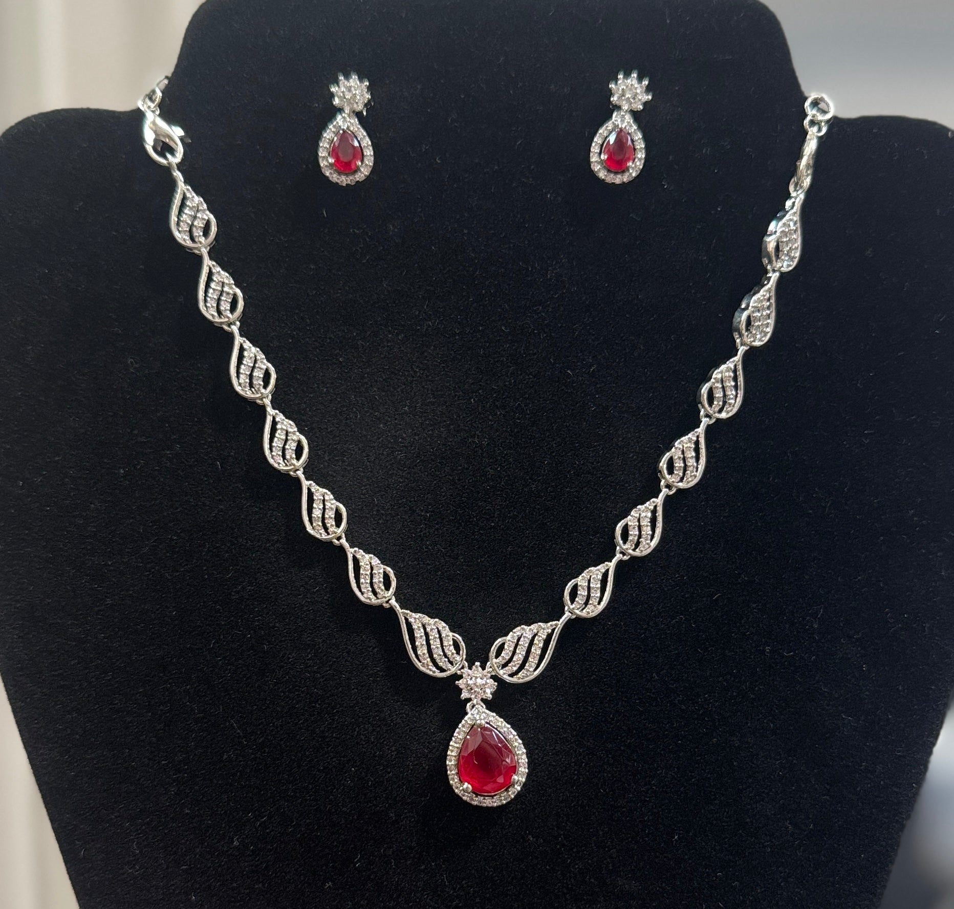 Appealing American Diamond Red Color Stones Necklace And Earrings Set