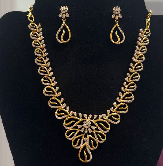 Alluring White Stone Embedded Gold Plated Necklace With Earrings Set