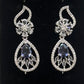 Dazzling White and Purple Stones Gold American Diamond Earrings
