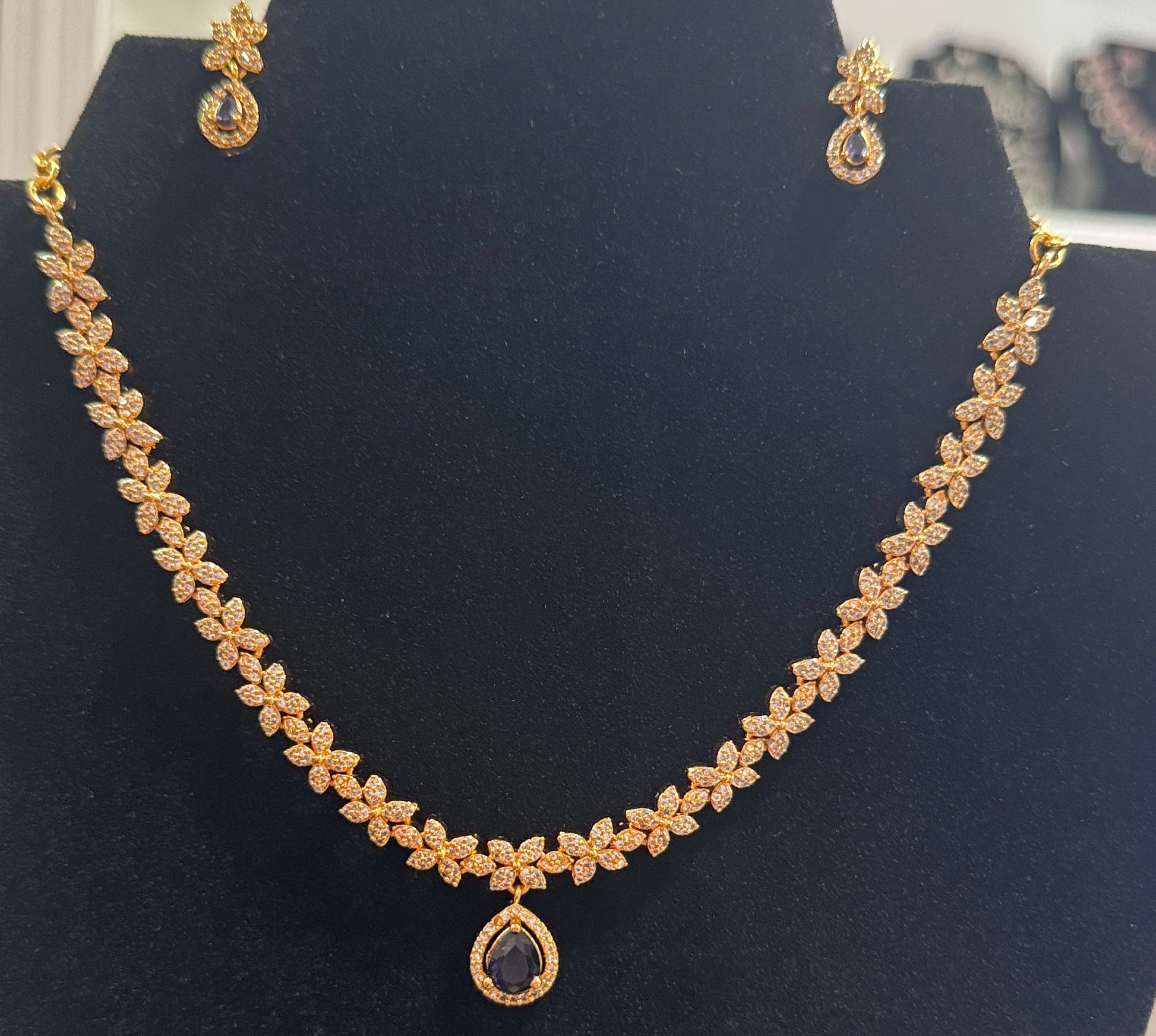 Fabulous Purple And White Colored Stone Gold Plated Necklace With Earrings Set Near Me
