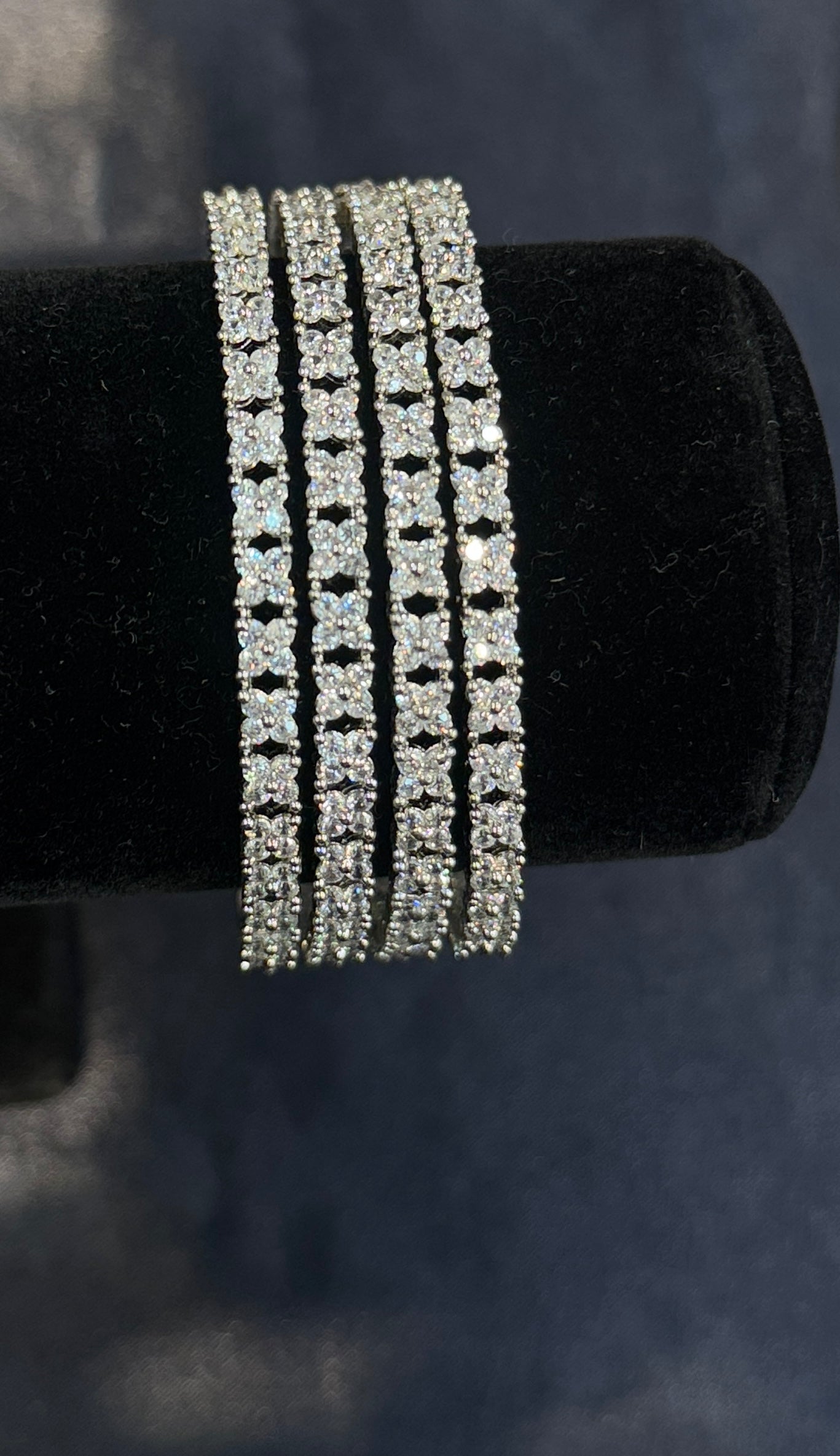 Beautiful White Stones Flower Design American Diamond Bangles.